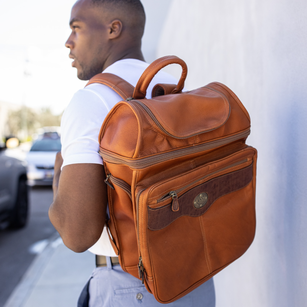 Leather sales handbag backpack